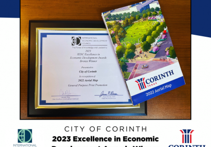 Graphic showing the award plaque from IEDC and the aerial map.